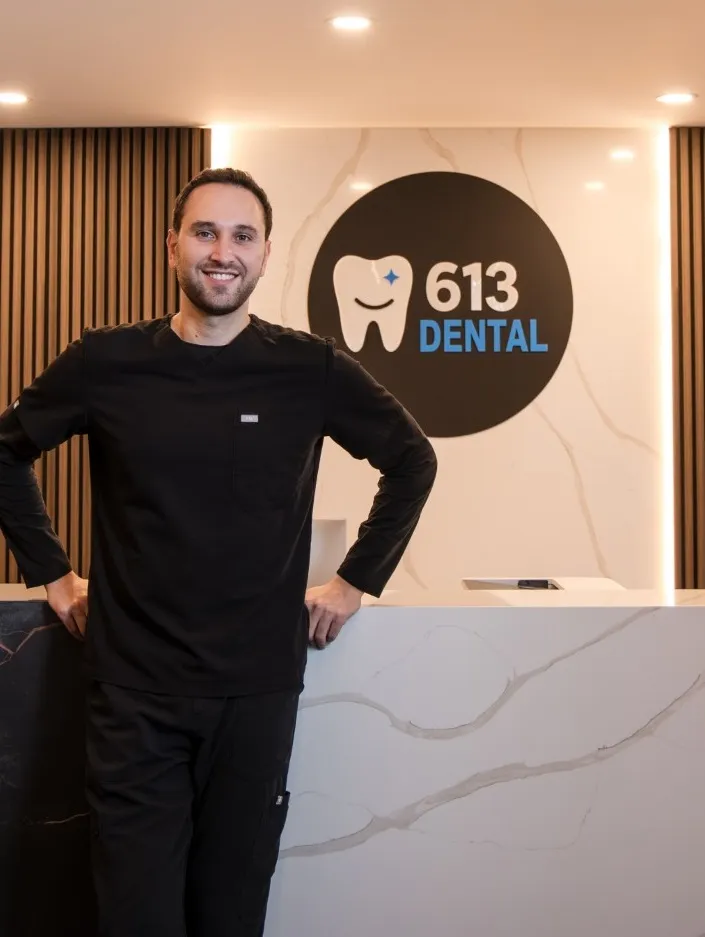 Dentist and 613 dental logo